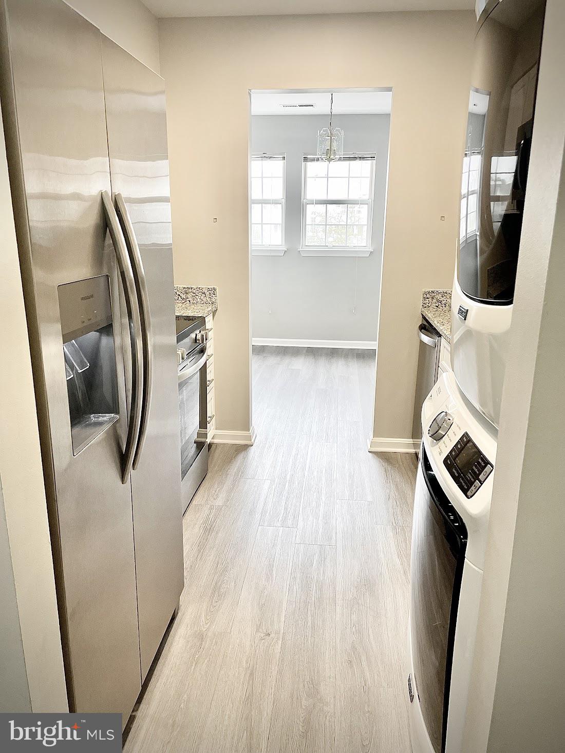 8343 Montgomery Run Road Ellicott City, MD 21043 - Photo 25 of 36 Modern kitchen with sleek appliances.
