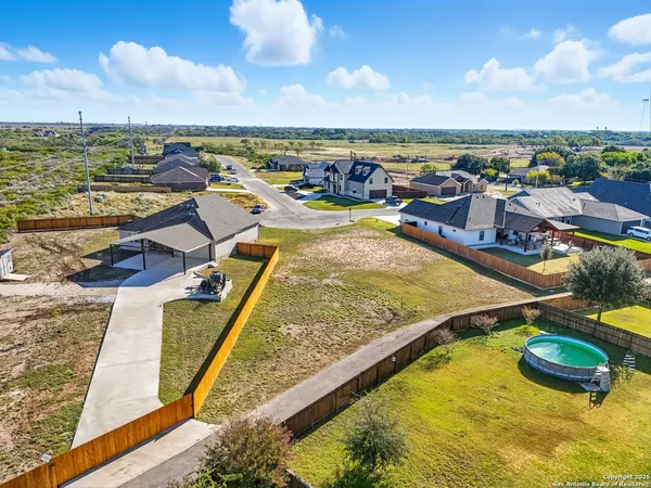 a view of a swimming pool with an ocean view