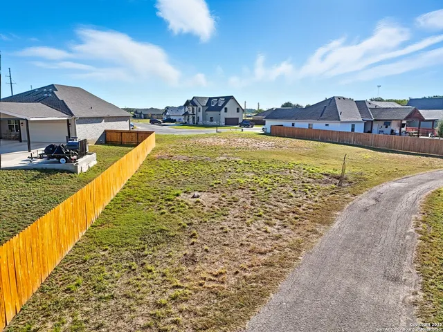 a view of a swimming pool with an ocean view