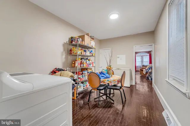 a workspace with furniture and wooden floor