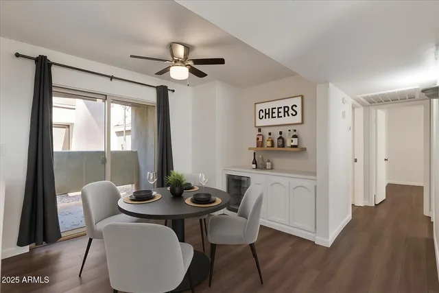 a kitchen with stainless steel appliances a sink and a refrigerator