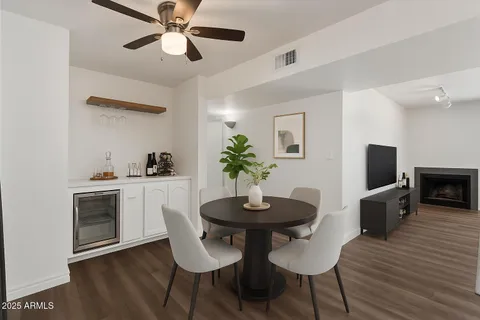 a kitchen with stainless steel appliances a sink and a refrigerator