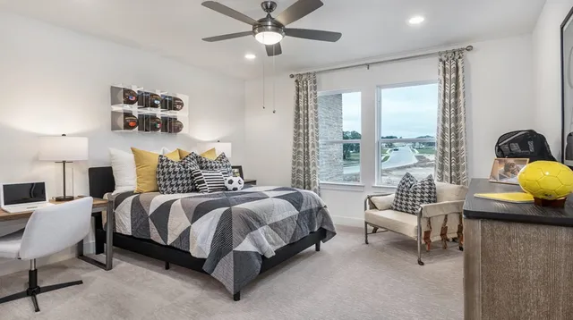 a spacious bedroom with a bed and window