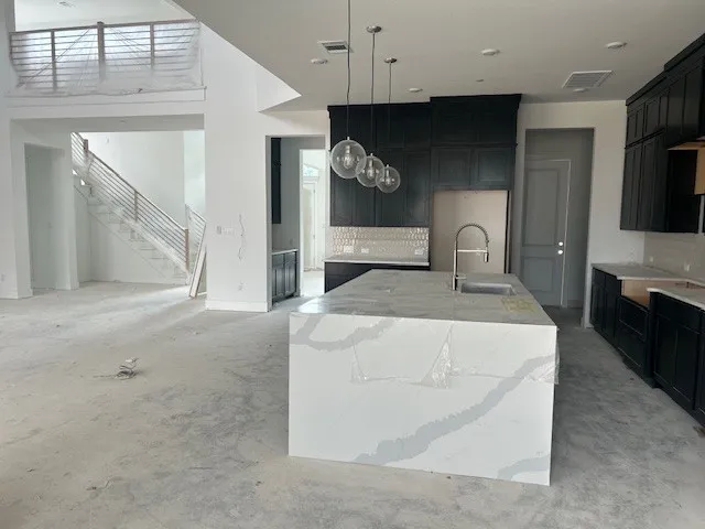 a living room with a couch and a flat screen tv
