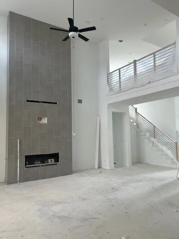 en empty room with closet and windows