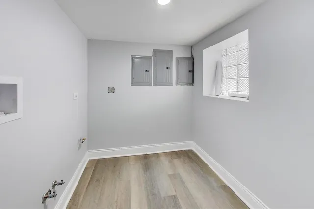 a view of an empty room with a window