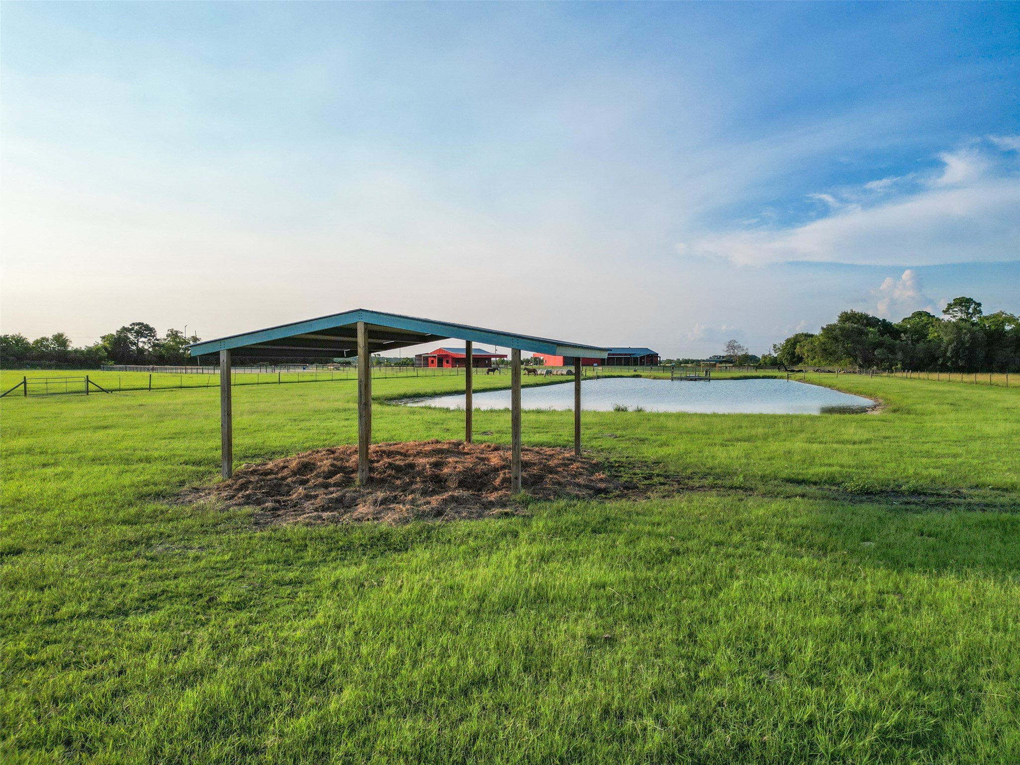 1402 Eagle Ferry Road Anahuac, TX 77514 - Photo 46 of 48 20’ x 25’ covered turnout area with water access, set within one of the four 100’ x 100’ turnout pens.