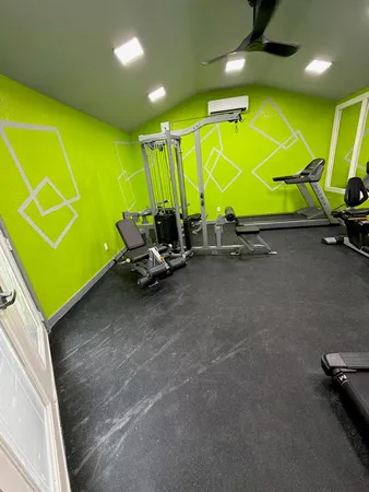 a view of a room with gym equipment