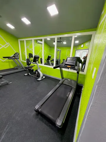 a view of a room with gym equipment