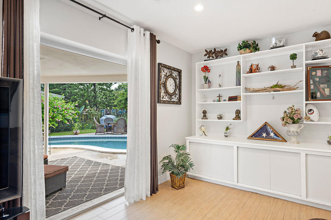 1045 Northwest 6th Avenue Boca Raton, FL 33432 - Photo 13 of 39 Family Room out to patio