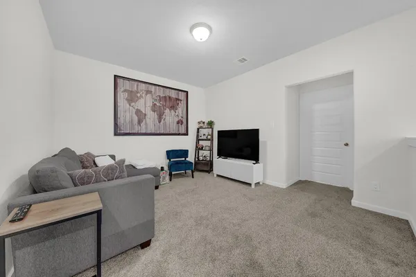 a big room with windows and closet