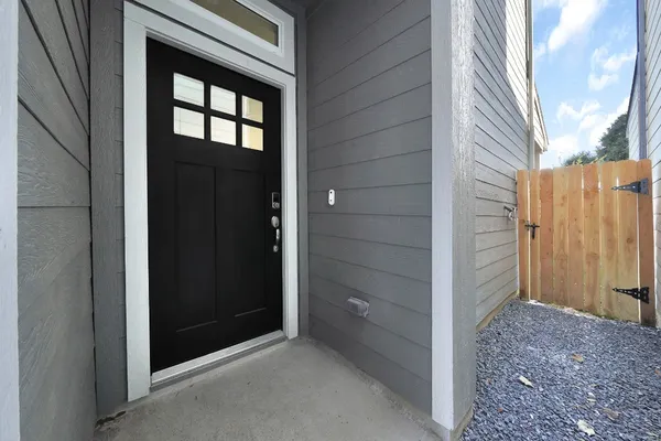 a view of kitchen and a sink with wooden floor