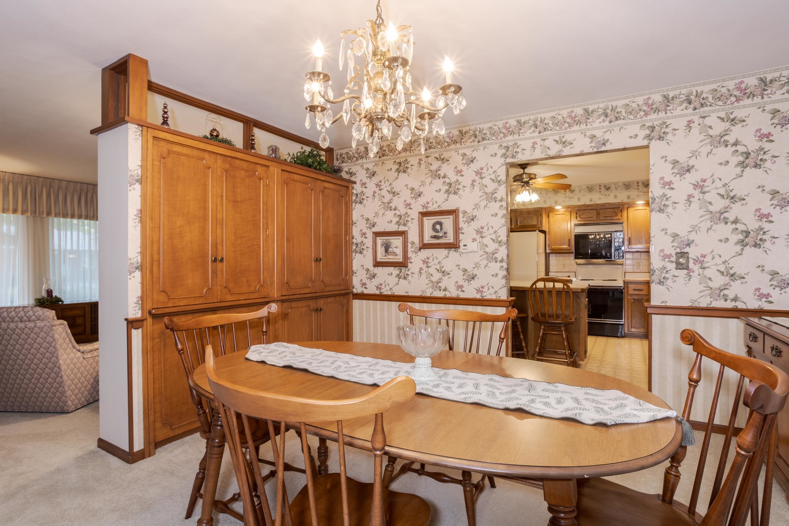11 Manor Drive Pontiac, IL 61764 - Photo 13 of 45 a view of a dining room with furniture and chandelier