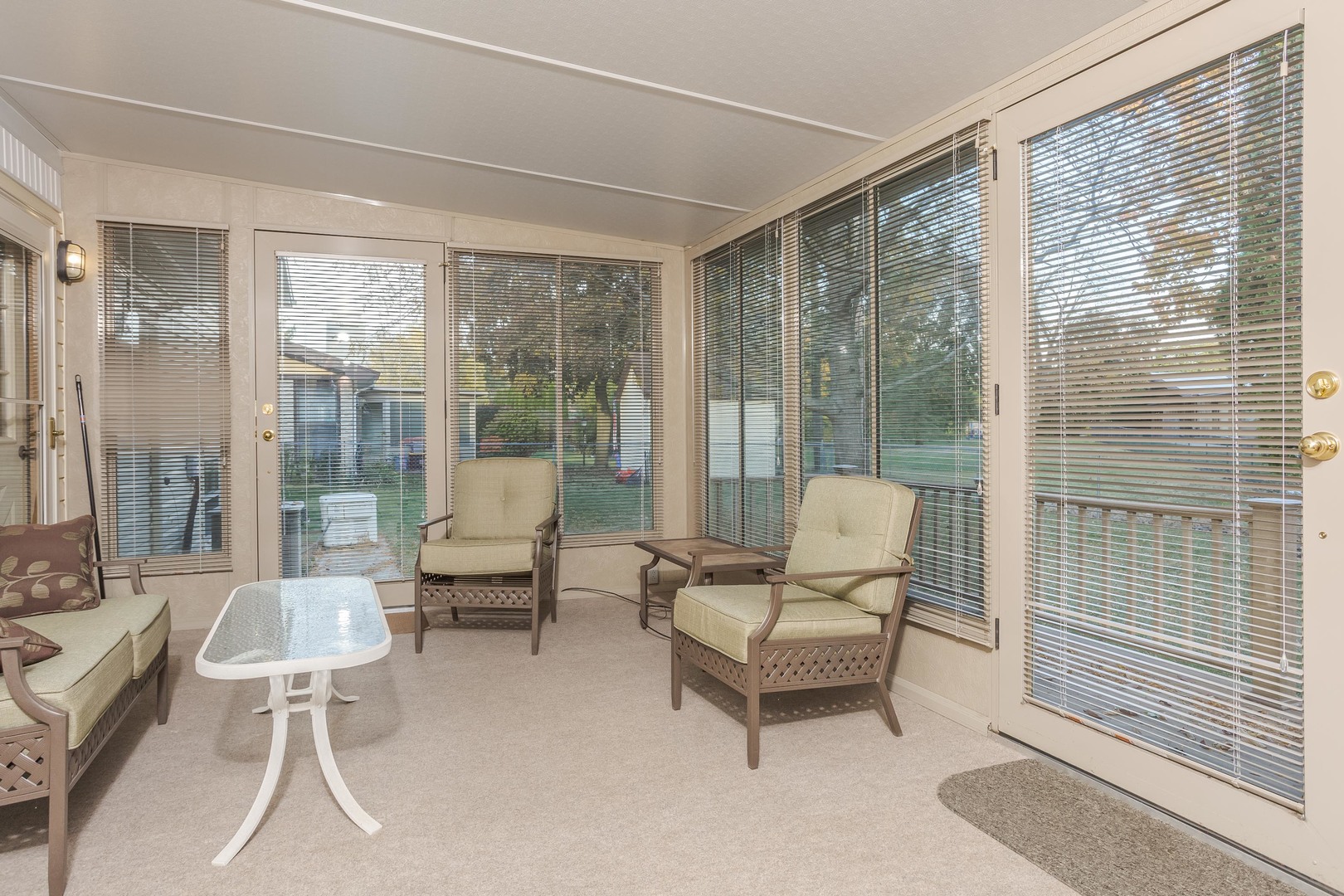 11 Manor Drive Pontiac, IL 61764 - Photo 15 of 45 a living room with furniture and a floor to ceiling window