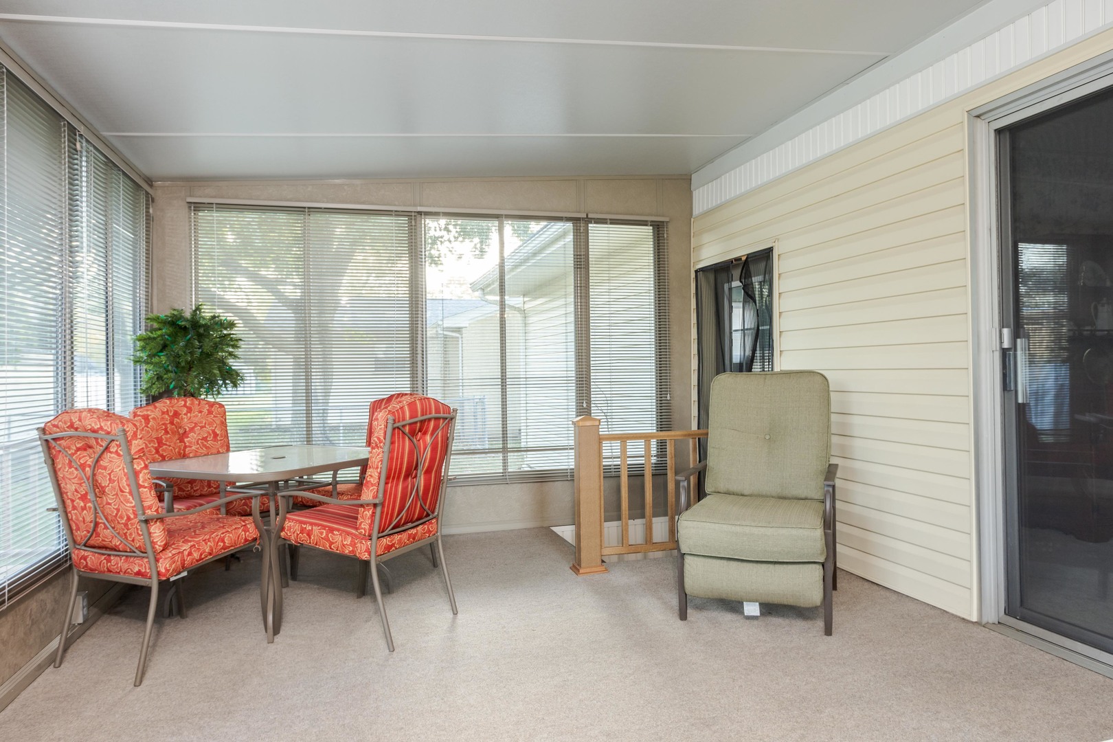 11 Manor Drive Pontiac, IL 61764 - Photo 16 of 45 a living room with furniture and a floor to ceiling window