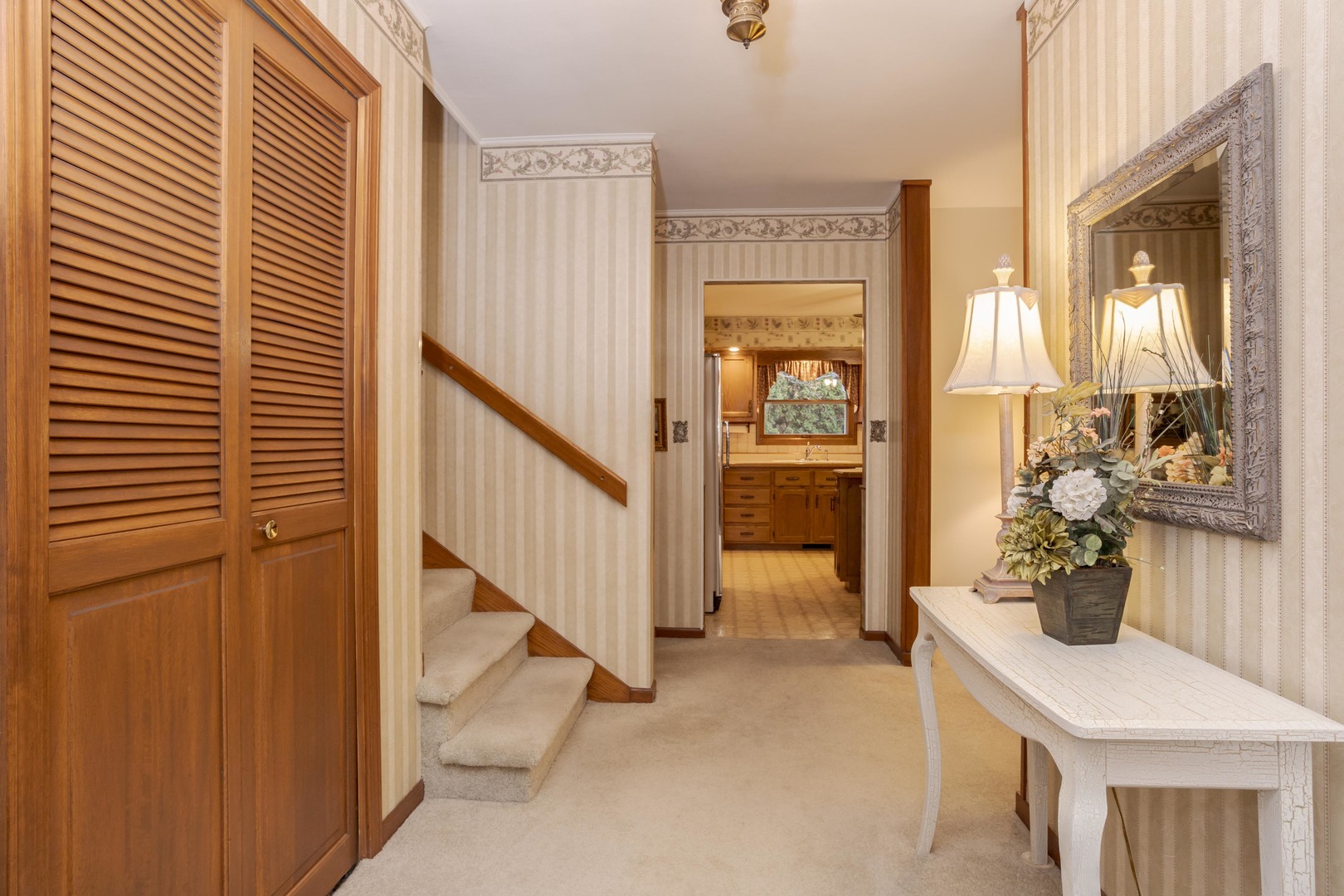 11 Manor Drive Pontiac, IL 61764 - Photo 18 of 45 a view of a hallway to a livingroom with furniture and white walls
