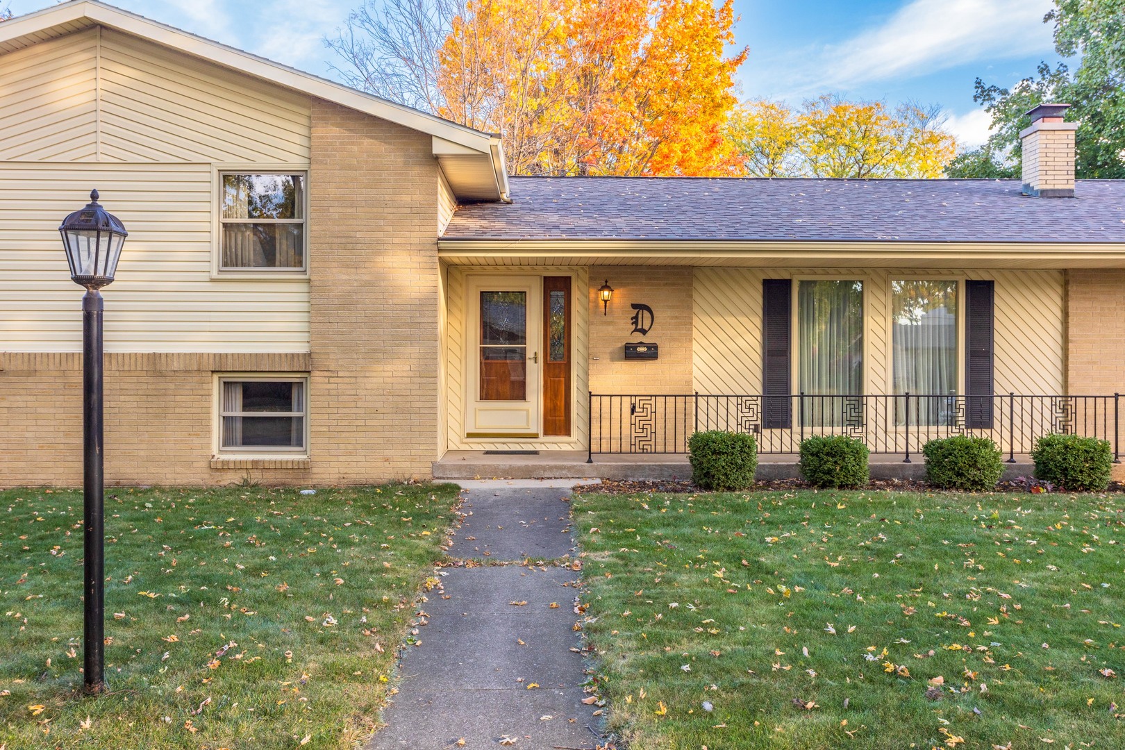 11 Manor Drive Pontiac, IL 61764 - Photo 2 of 45 a view of a brick house with a large windows
