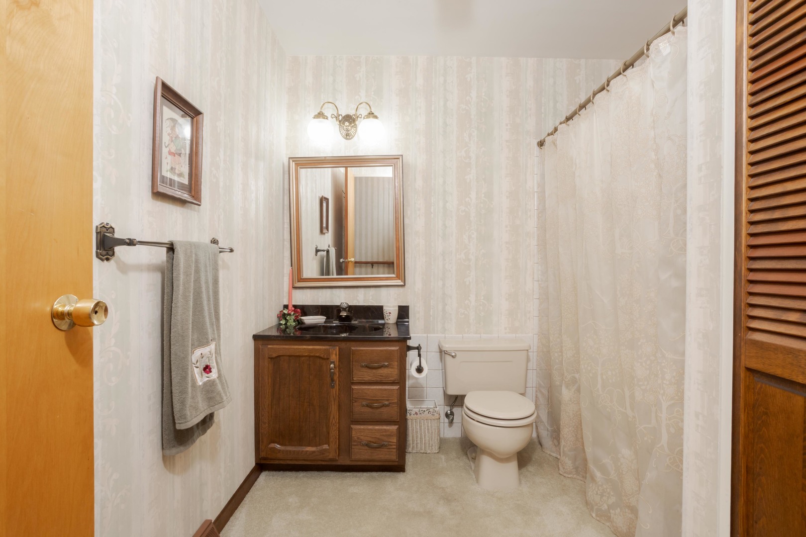 11 Manor Drive Pontiac, IL 61764 - Photo 21 of 45 a bathroom with a granite countertop sink toilet and shower