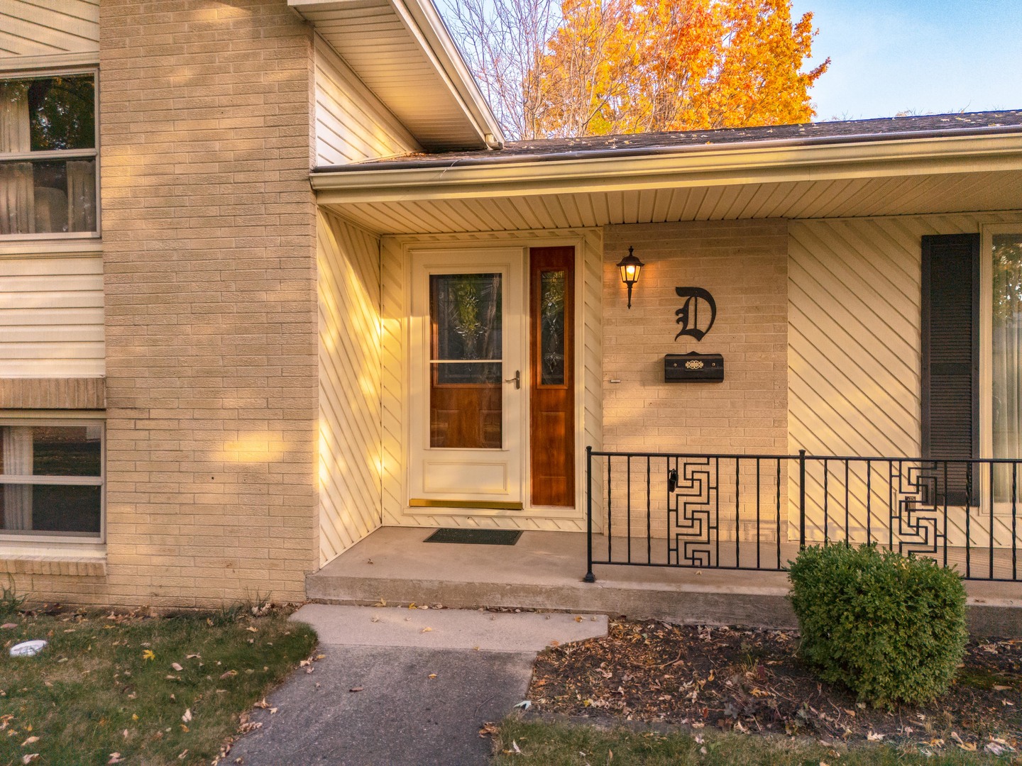 11 Manor Drive Pontiac, IL 61764 - Photo 44 of 45 a view of a house with a small yard and wooden floor and fence