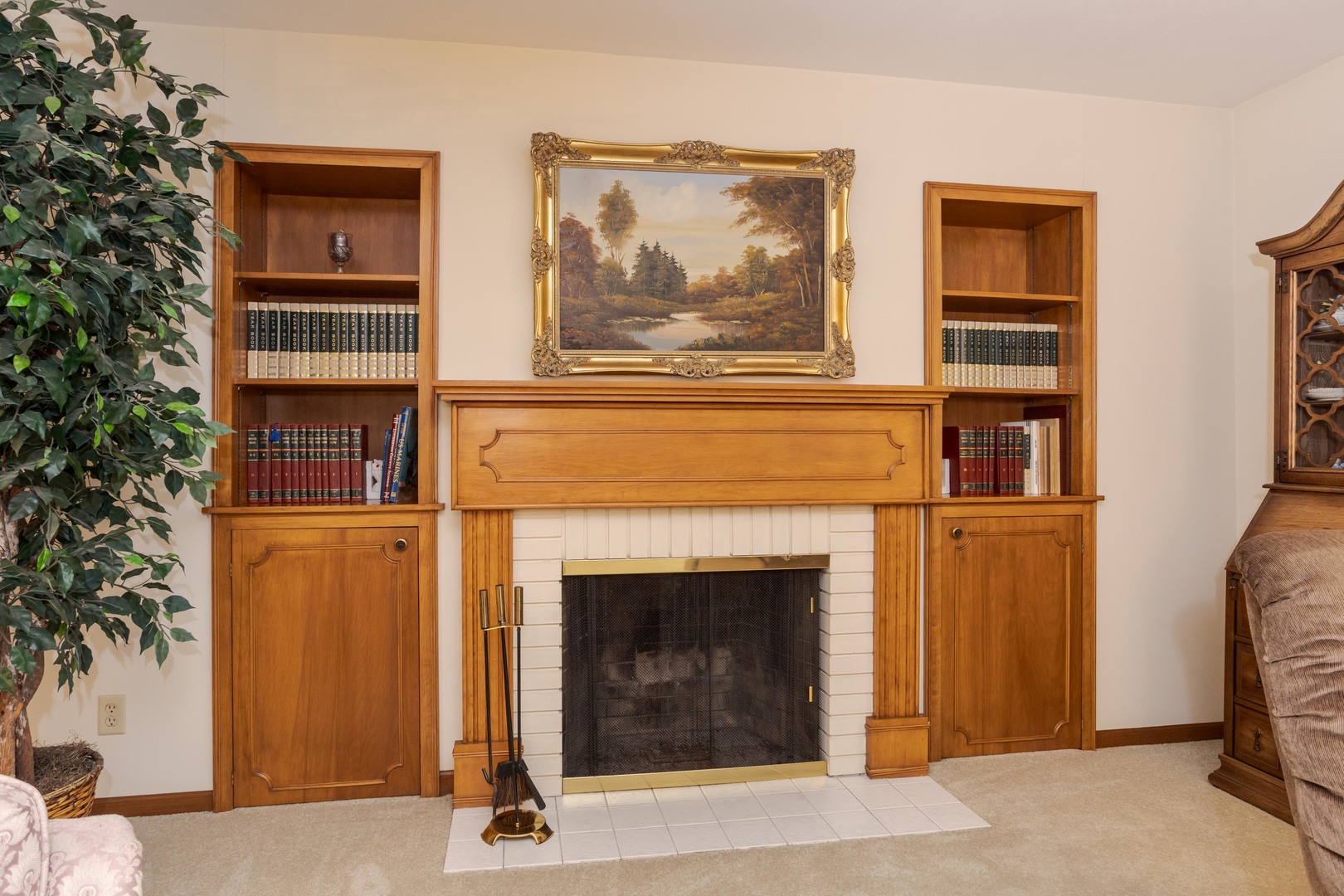 11 Manor Drive Pontiac, IL 61764 - Photo 7 of 45 a living room with fireplace and a window