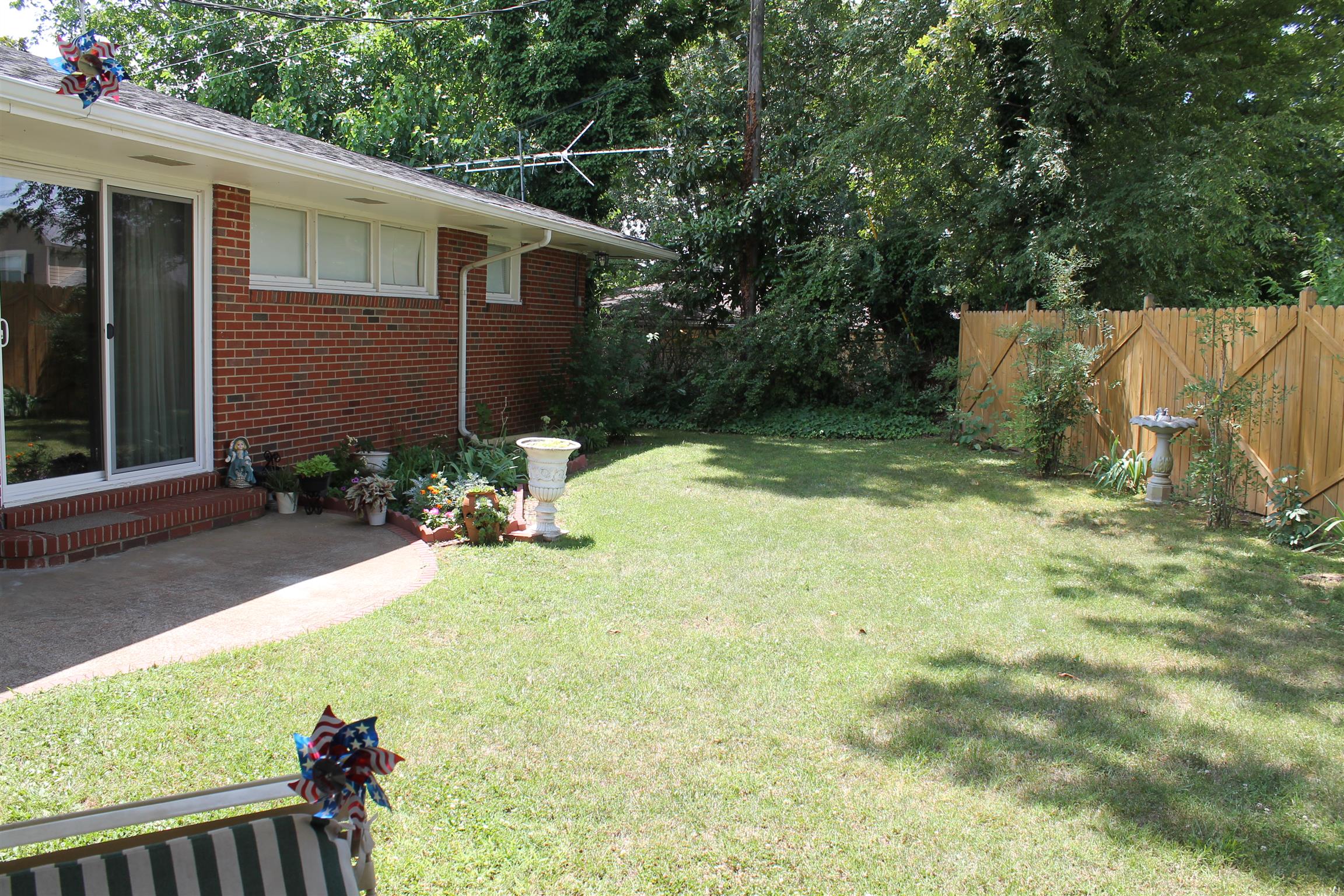 107 Lakeview Drive Dickson, TN 37055 - Photo 12 of 30 a view of backyard with a tub and seating space