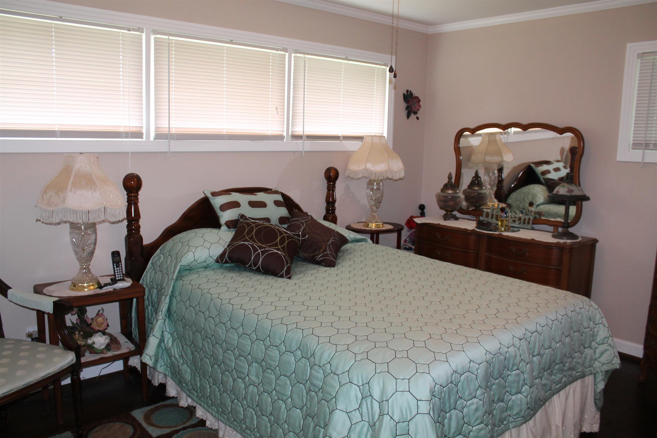 107 Lakeview Drive Dickson, TN 37055 - Photo 26 of 30 a bedroom with a bed and a window