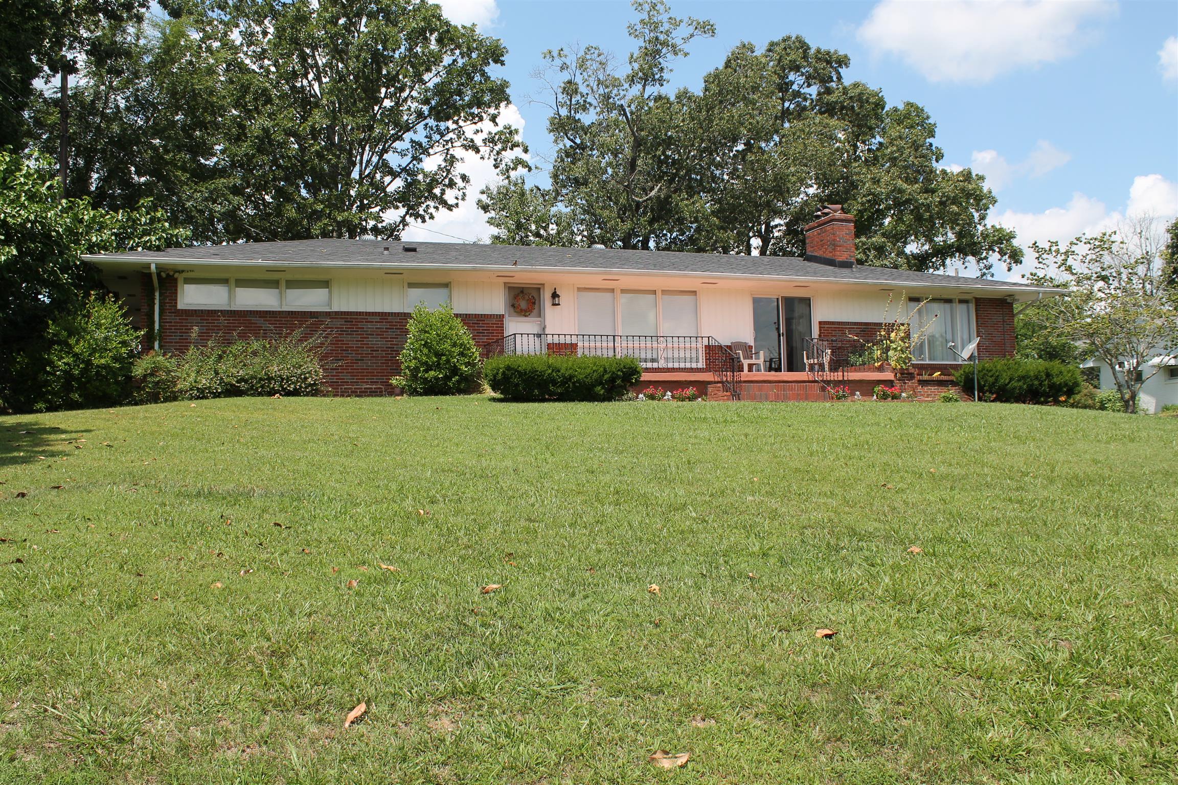 107 Lakeview Drive Dickson, TN 37055 - Photo 30 of 30 a view of a house with a yard and sitting area