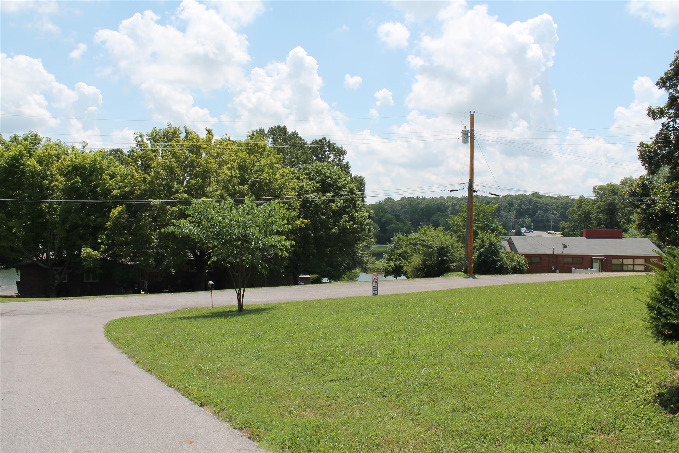 107 Lakeview Drive Dickson, TN 37055 - Photo 7 of 30 a view of a garden with a fountain