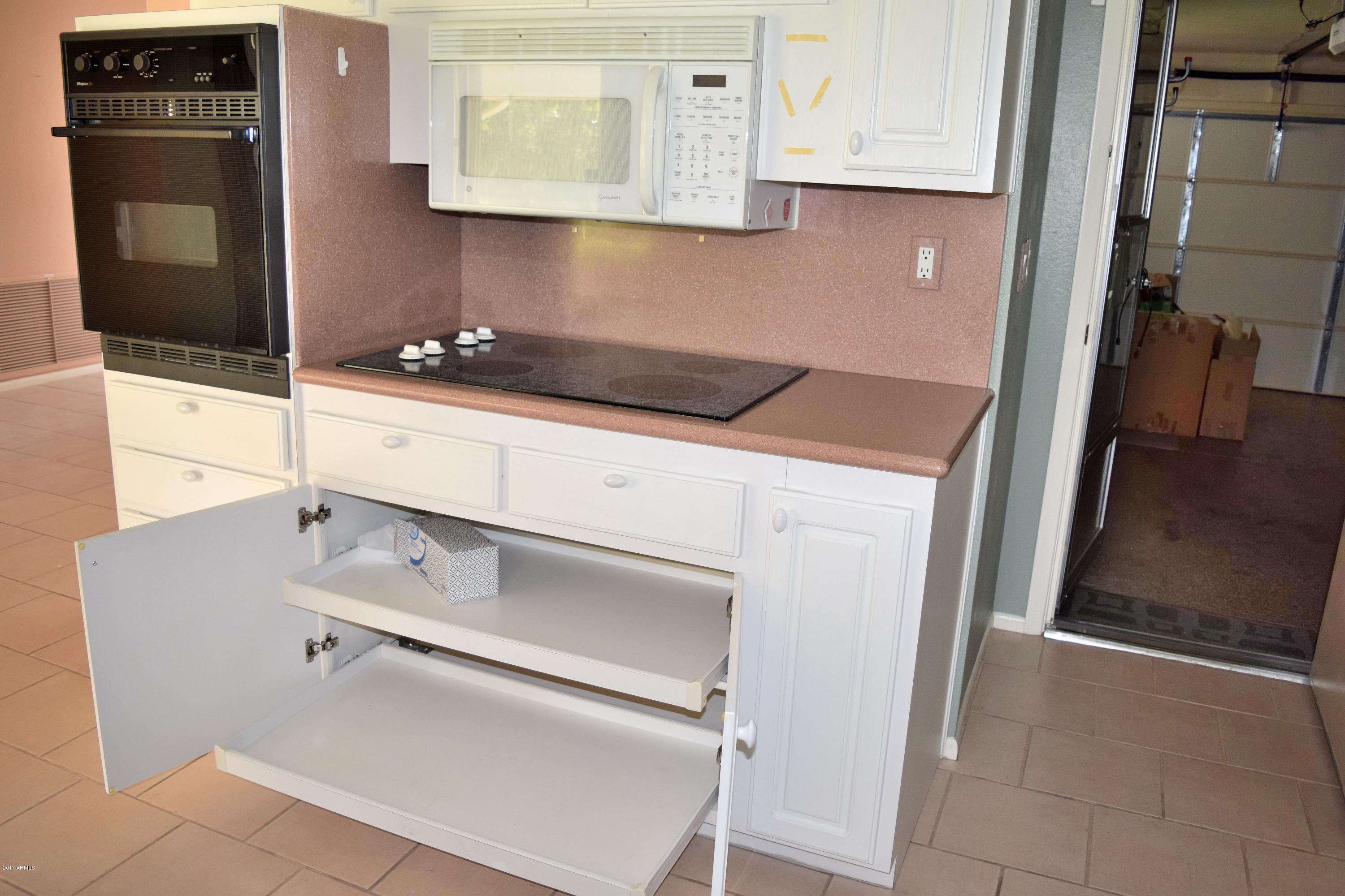 10721 West Hatcher Road Sun City, AZ 85351 - Photo 11 of 52 Roll out shelves