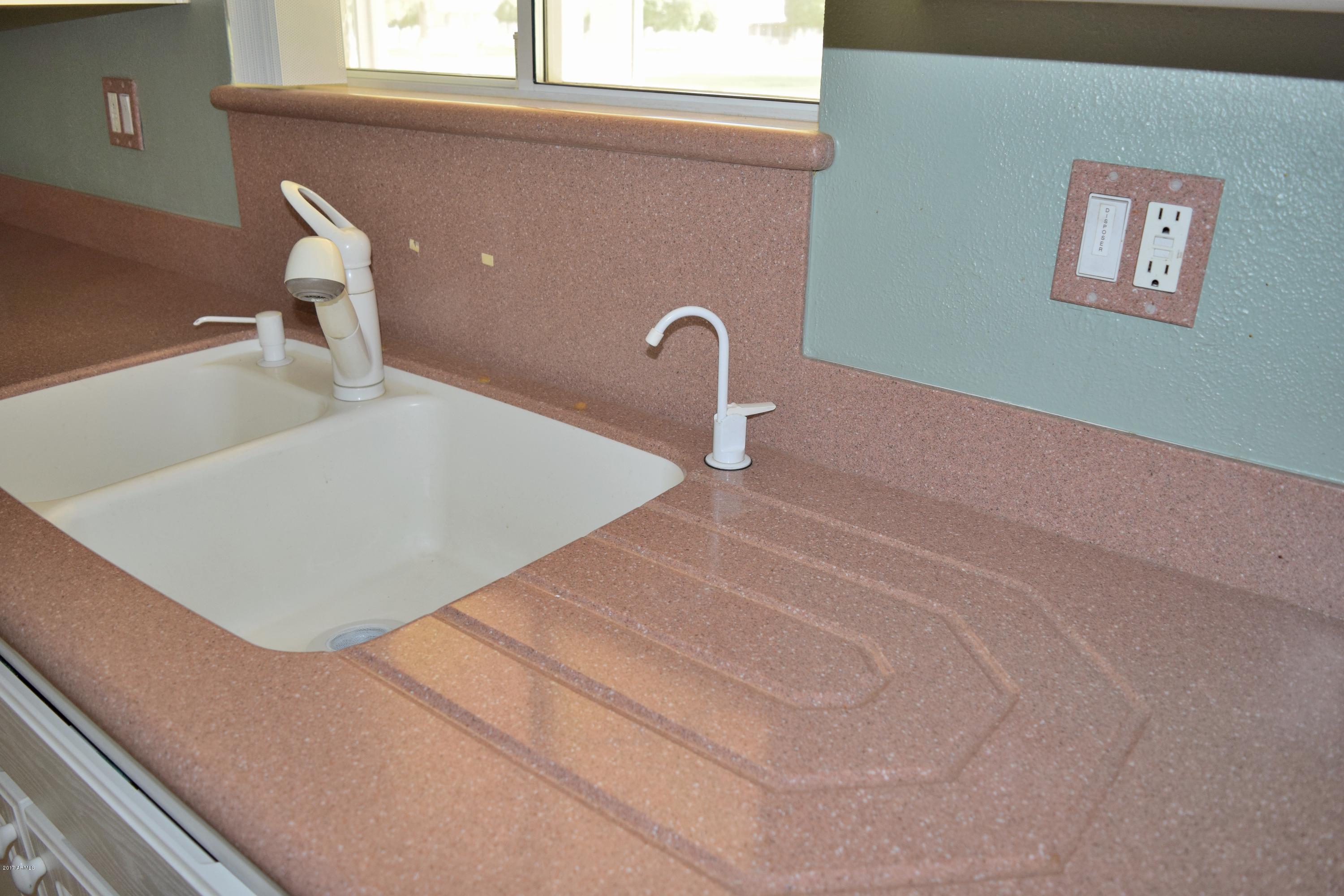 10721 West Hatcher Road Sun City, AZ 85351 - Photo 12 of 52 Corian Countertops