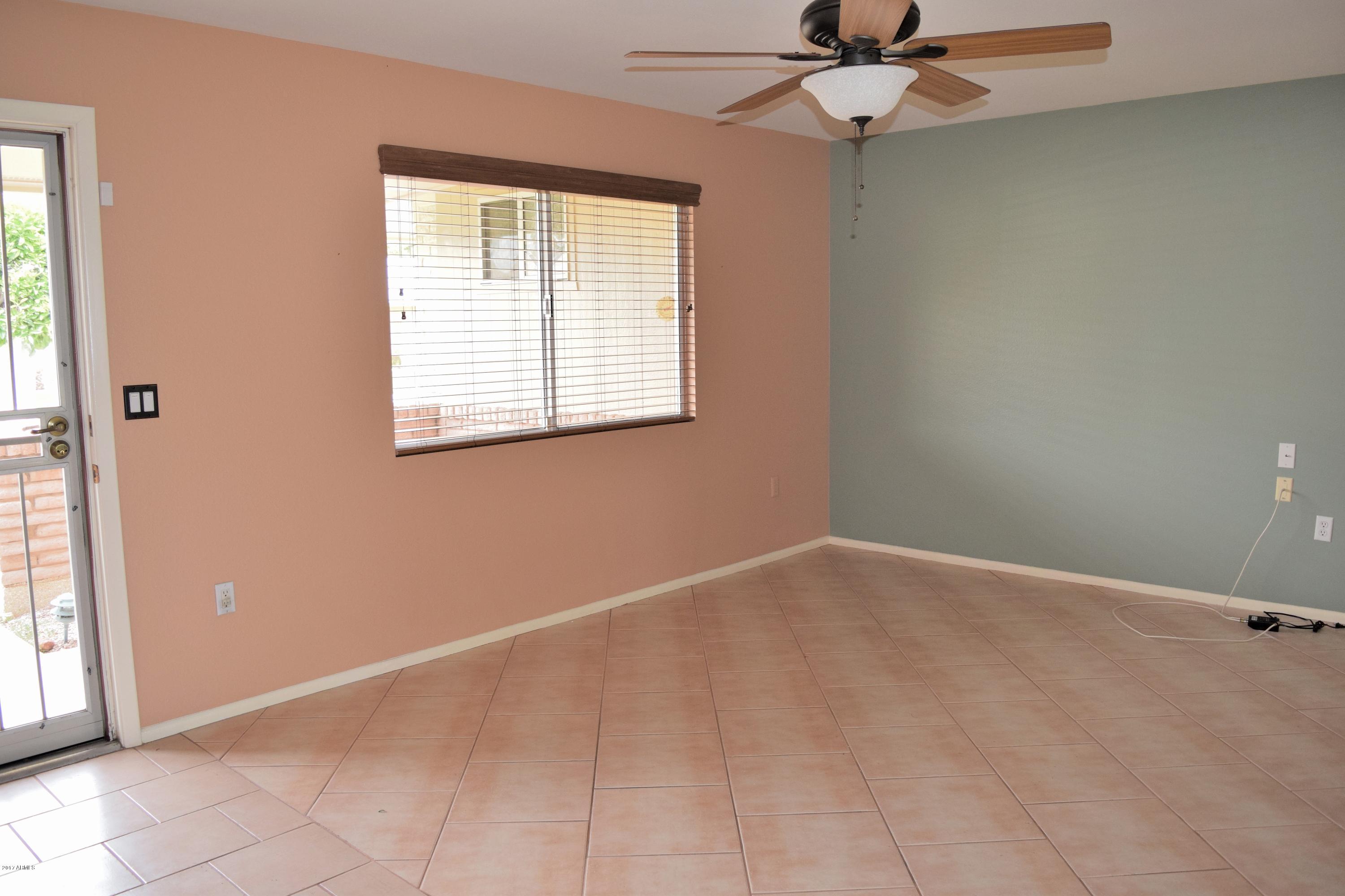 10721 West Hatcher Road Sun City, AZ 85351 - Photo 5 of 52 Living Room 3