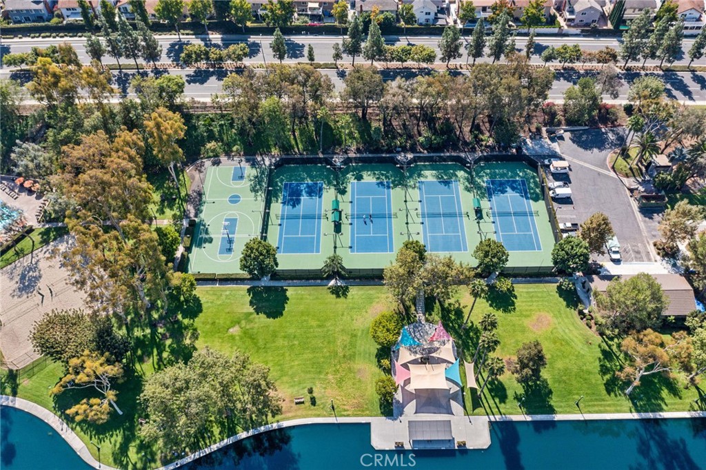 24746 Scott Lane Lake Forest, CA 92630 - Photo 30 of 31 an aerial view of a house with a garden and lake view