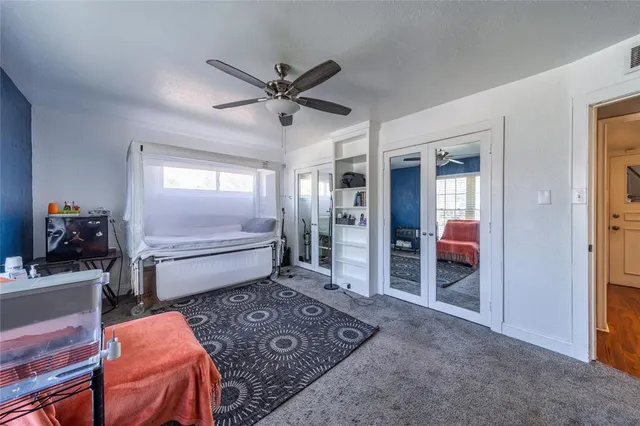 a room with a bed and a window