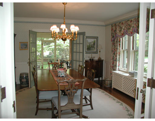 12 Whiting Road Wellesley, MA 02481 - Photo 5 of 9 a view of a dining room with furniture window and outside view