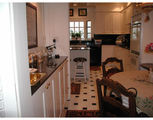 12 Whiting Road Wellesley, MA 02481 - Photo 6 of 9 a view of a kitchen with appliances and cabinets