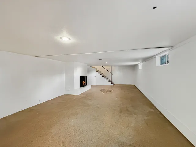 a view of a livingroom with a staircase