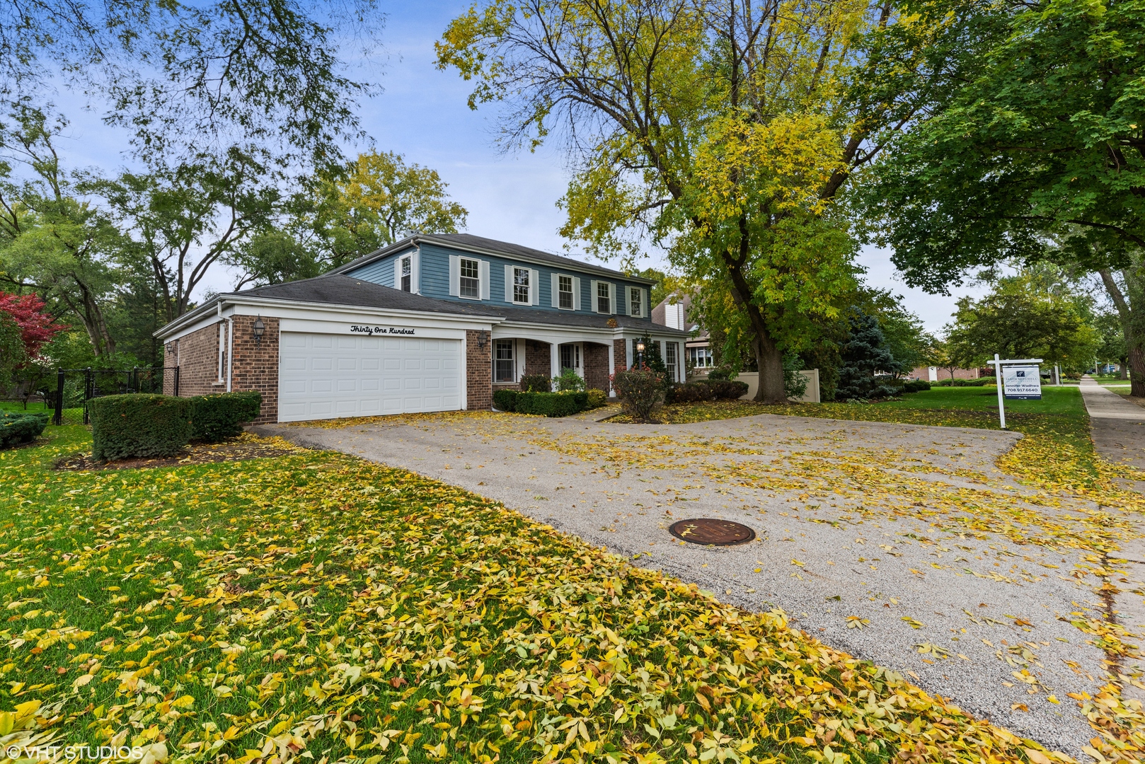 3100 Techny Road Northbrook, IL 60062 - Photo 2 of 28 a front view of a house with a yard