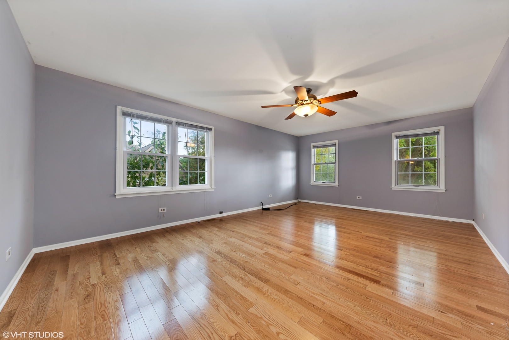 3100 Techny Road Northbrook, IL 60062 - Photo 15 of 28 an empty room with window and ceiling fan