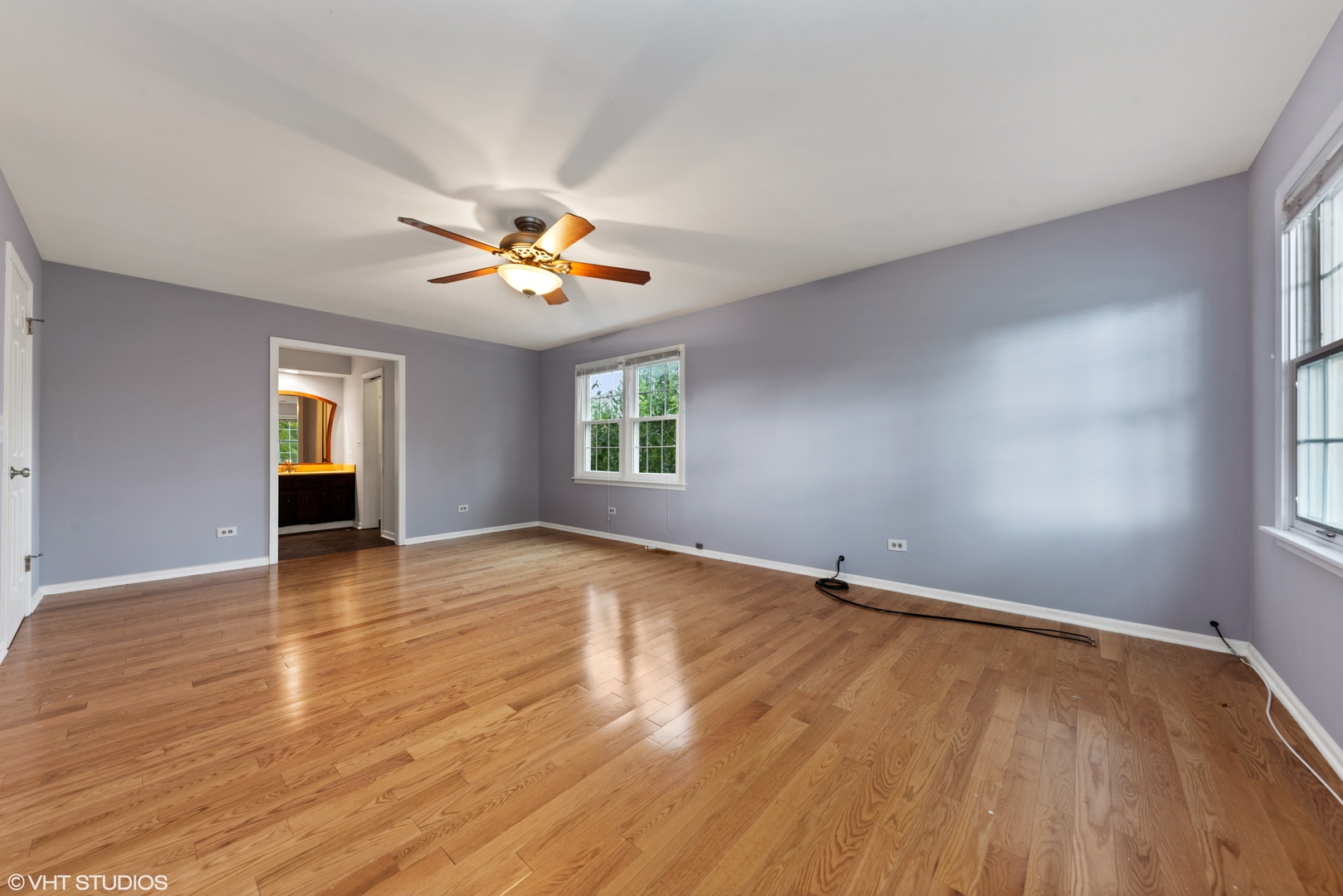 3100 Techny Road Northbrook, IL 60062 - Photo 16 of 28 an empty room with wooden floor and windows