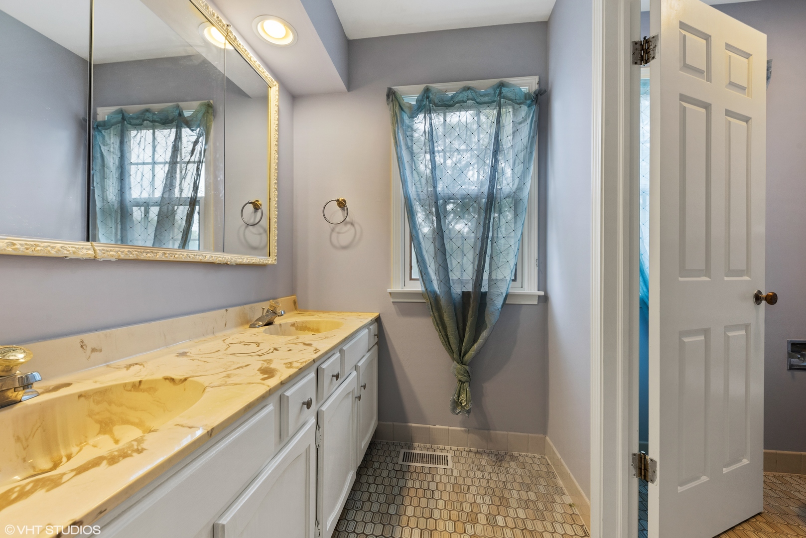 3100 Techny Road Northbrook, IL 60062 - Photo 21 of 28 a bathroom with a granite countertop sink and a window