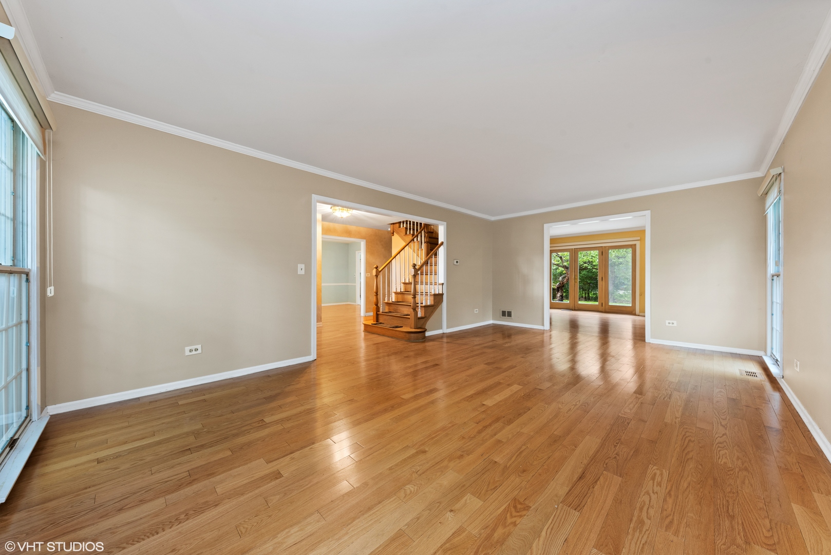 3100 Techny Road Northbrook, IL 60062 - Photo 4 of 28 a view of empty room with wooden floor and fan