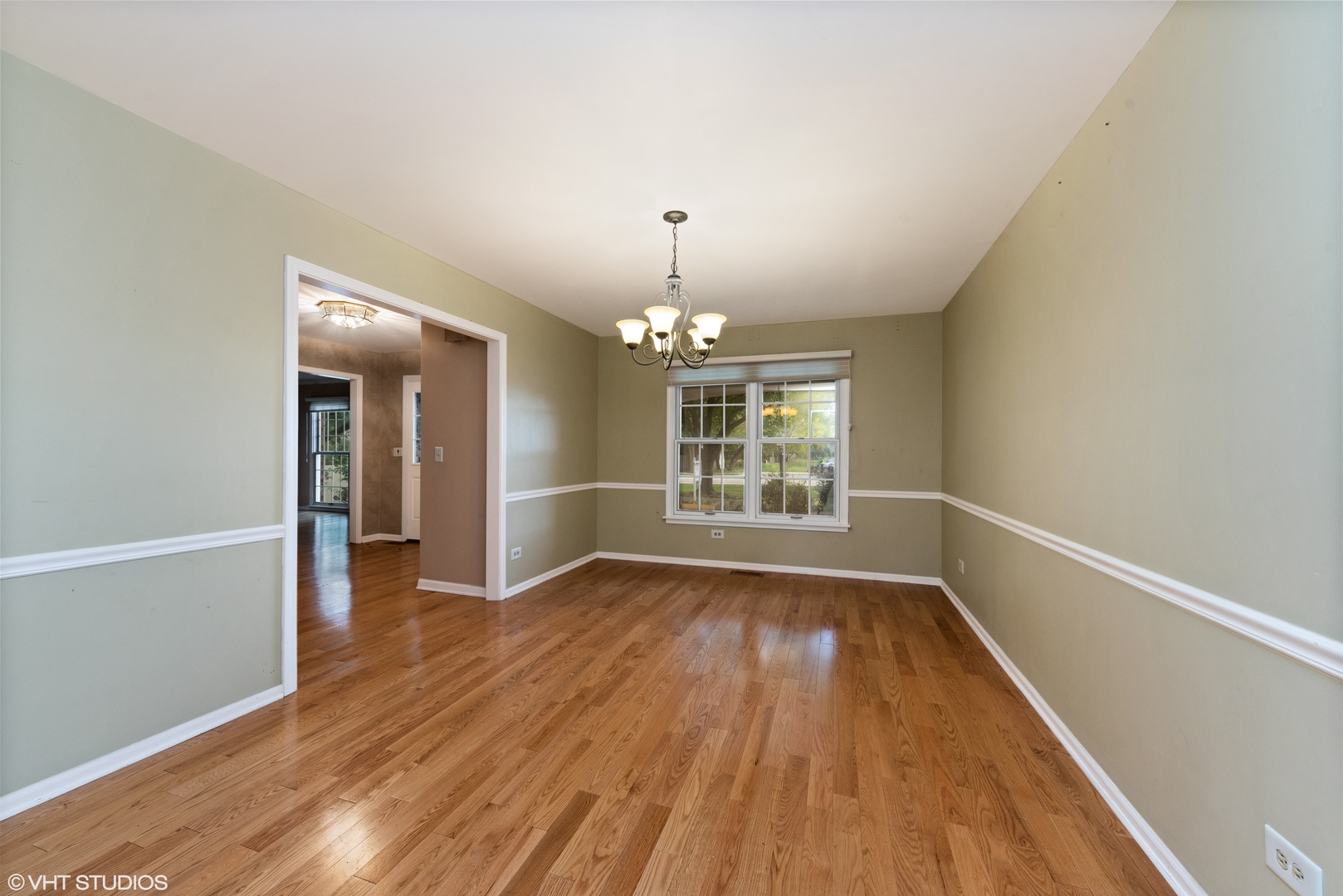 3100 Techny Road Northbrook, IL 60062 - Photo 10 of 28 wooden floor in an empty room with a window