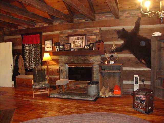 5089 Purchase Line Road Commodore, PA 15729 - Photo 3 of 15 Great Room. Great Room features large stone fireplace with hardwood floors