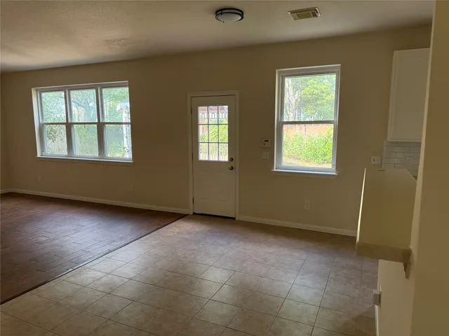 an empty room with windows