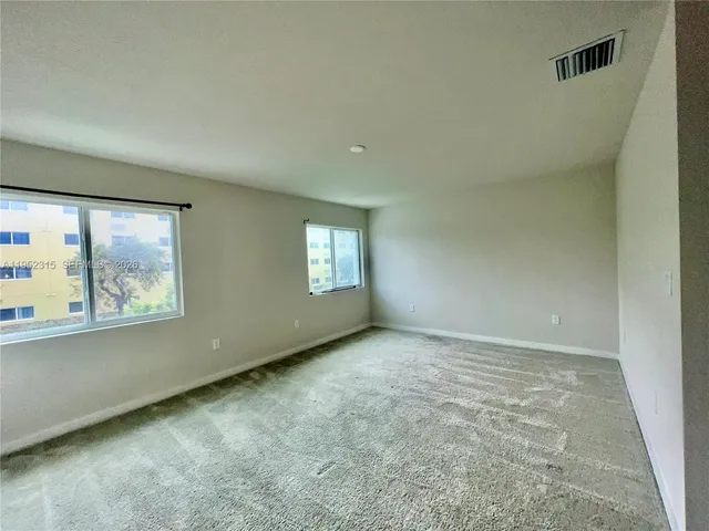 an empty room with window