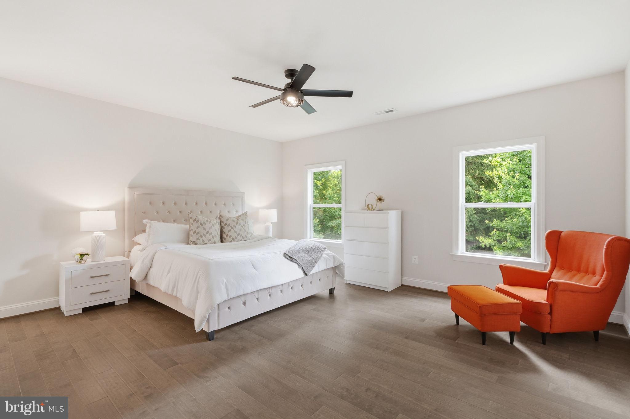 7821 Old Falls Road McLean, VA 22102 - Photo 33 of 62 a bedroom with a bed and a couch