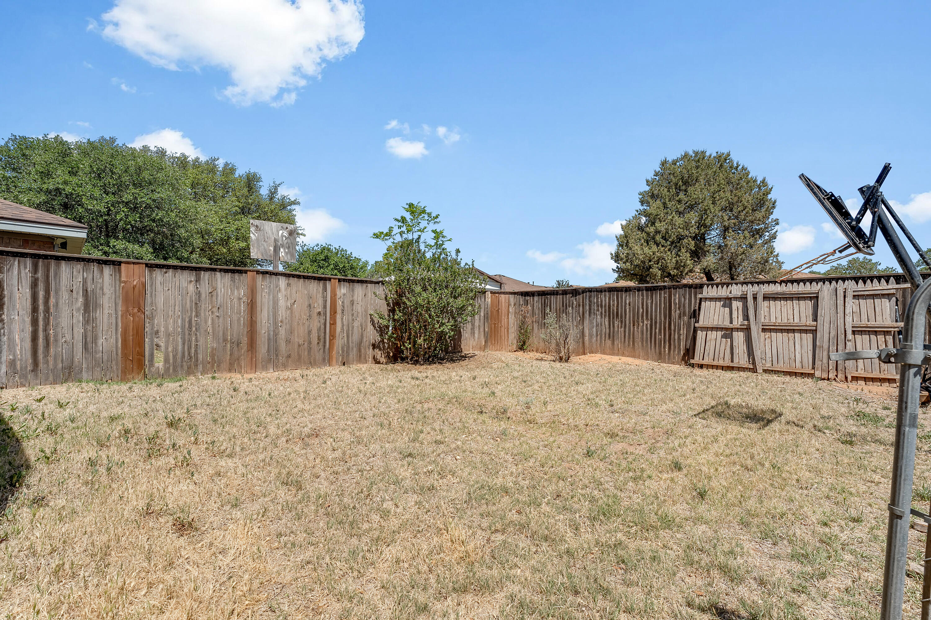 5236 91st Street Lubbock, TX 79424 - Photo 22 of 23 a view of wooden fence