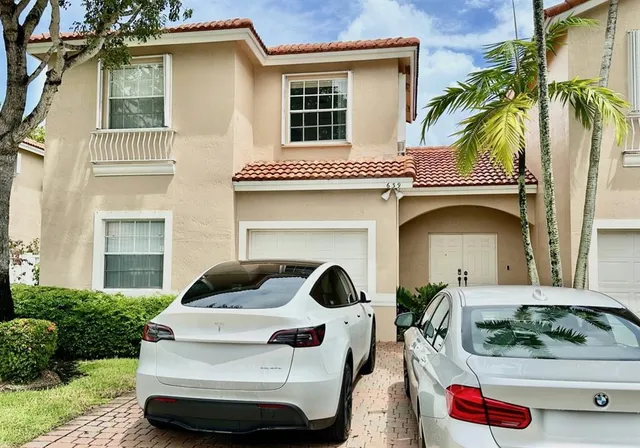a front view of house with outdoor space