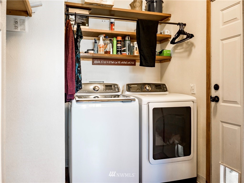 291 Spencer Road Sequim, WA 98382 - Photo 17 of 24 a utility room with dryer and washer