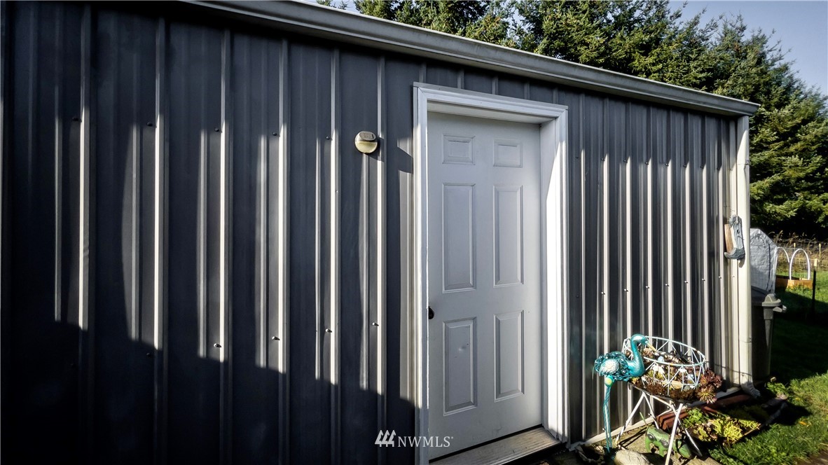 291 Spencer Road Sequim, WA 98382 - Photo 21 of 24 a view of a backyard of the house